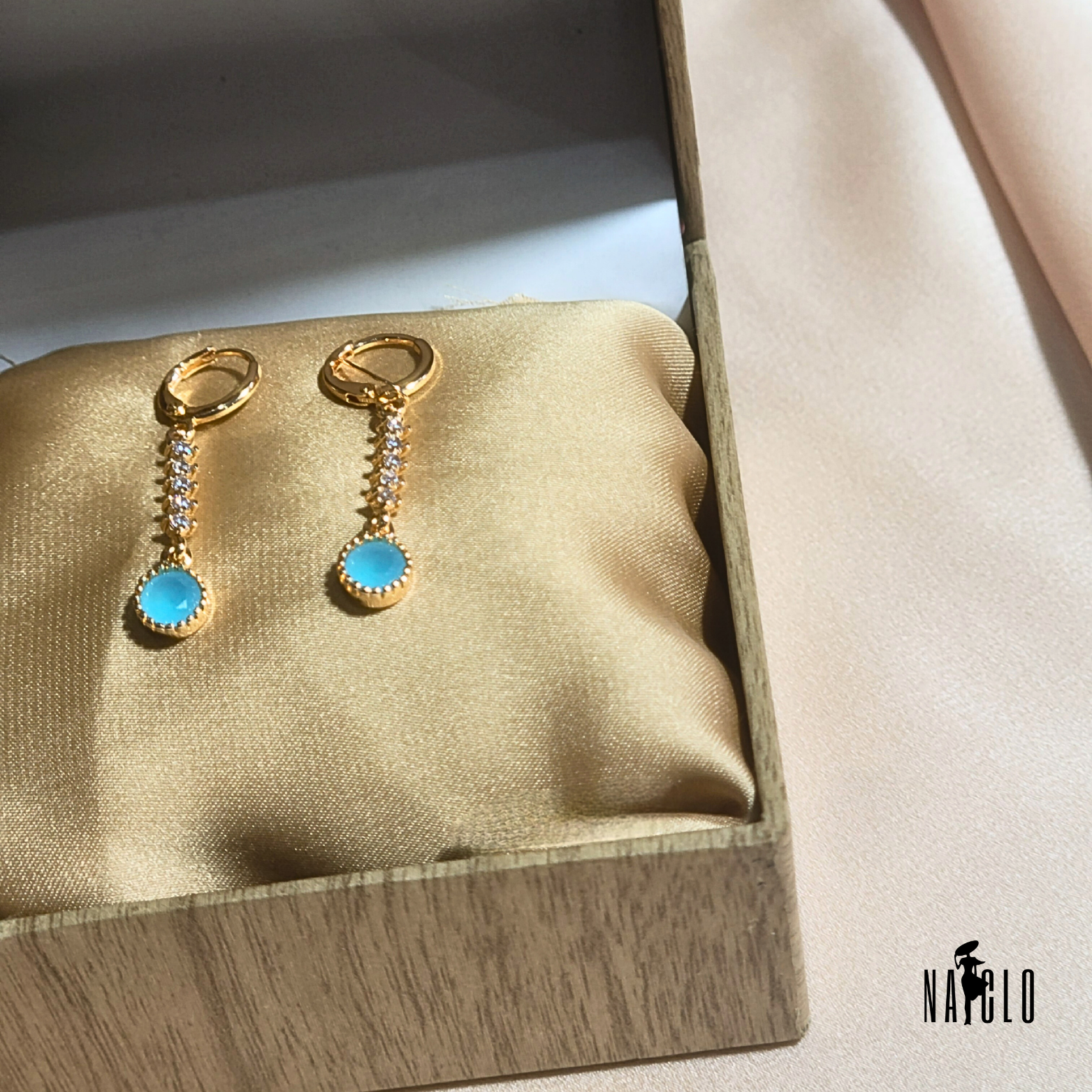 blue zircon gold earrings